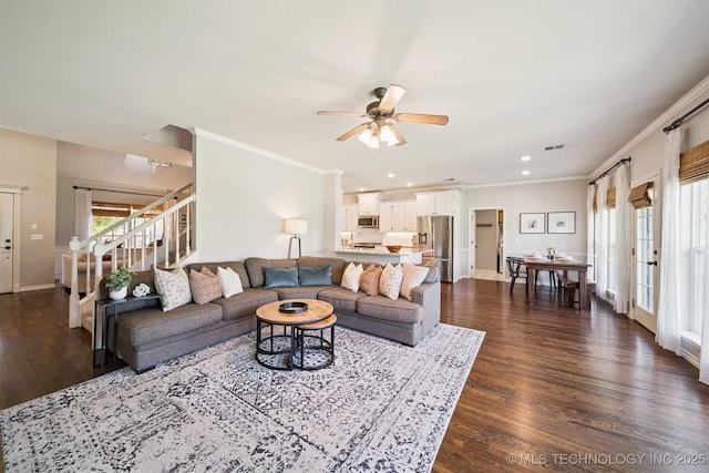 14003 E 87th Pl N, Owasso, OK 74055 - living room with dark wood finished floors, stairway, a ceiling fan, crown molding, and recessed lighting