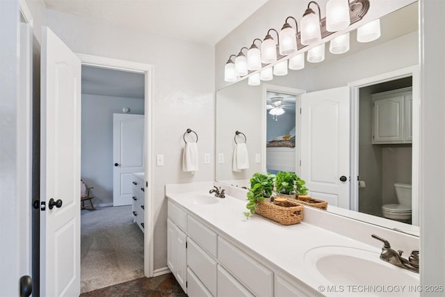 14003 E 87th Pl N, Owasso, OK 74055 - full bathroom with double vanity and ceiling fan