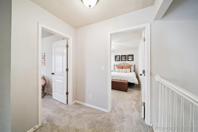 14003 E 87th Pl N, Owasso, OK 74055 - hallway with carpet flooring and baseboards