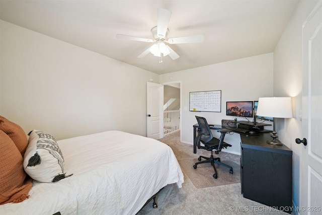 14003 E 87th Pl N, Owasso, OK 74055 - bedroom with light colored carpet, an office area, and a ceiling fan