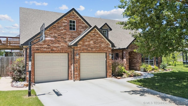 14003 E 87th Pl N, Owasso, OK 74055 - view of front of house featuring brick siding, concrete driveway, a shingled roof, and a garage