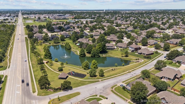 14003 E 87th Pl N, Owasso, OK 74055 - aerial view of property's location featuring a nearby body of water and nearby suburban area