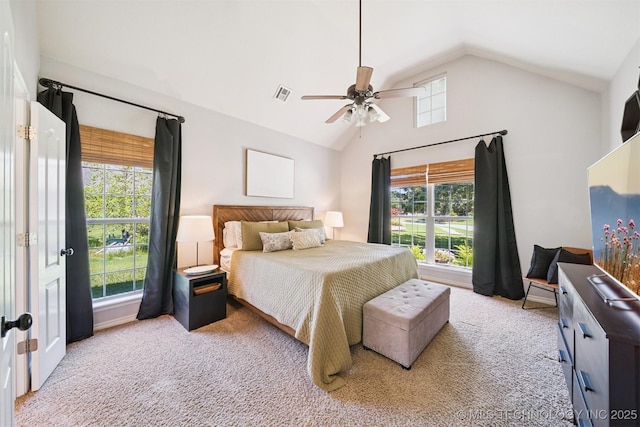 14003 E 87th Pl N, Owasso, OK 74055 - bedroom with vaulted ceiling, ceiling fan, and carpet