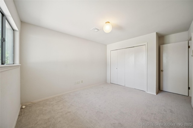 8912 S 70th E Ave, Tulsa, OK 74133 - unfurnished bedroom with carpet flooring and a closet