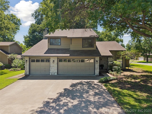 8912 S 70th E Ave, Tulsa, OK 74133 - view of front of home with stone siding, concrete driveway, a chimney, a shingled roof, and a garage