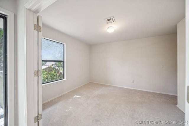 8912 S 70th E Ave, Tulsa, OK 74133 - empty room featuring light carpet