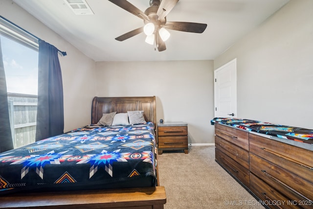 7413 N 160th E Ave, Owasso, OK 74055 - carpeted bedroom with a ceiling fan and baseboards