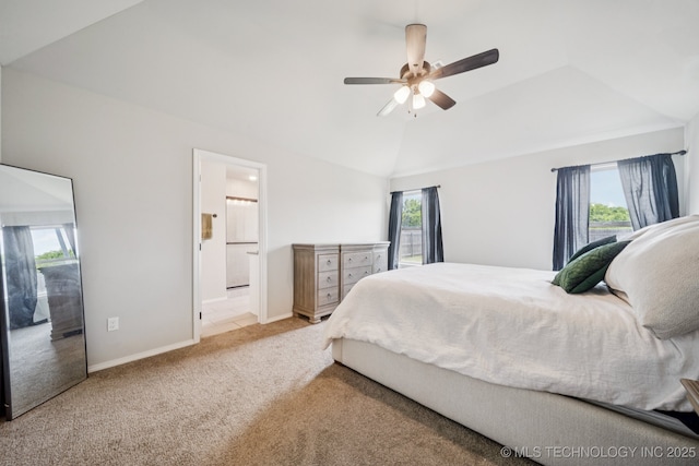 7413 N 160th E Ave, Owasso, OK 74055 - carpeted bedroom featuring lofted ceiling, ensuite bathroom, and ceiling fan