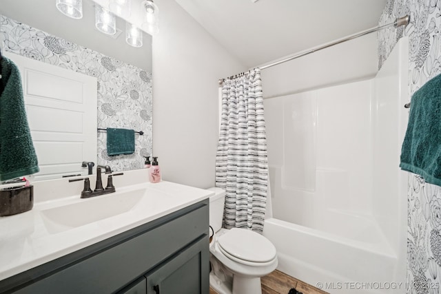 7413 N 160th E Ave, Owasso, OK 74055 - full bath with vanity, wallpapered walls, shower / bath combination with curtain, and wood finished floors