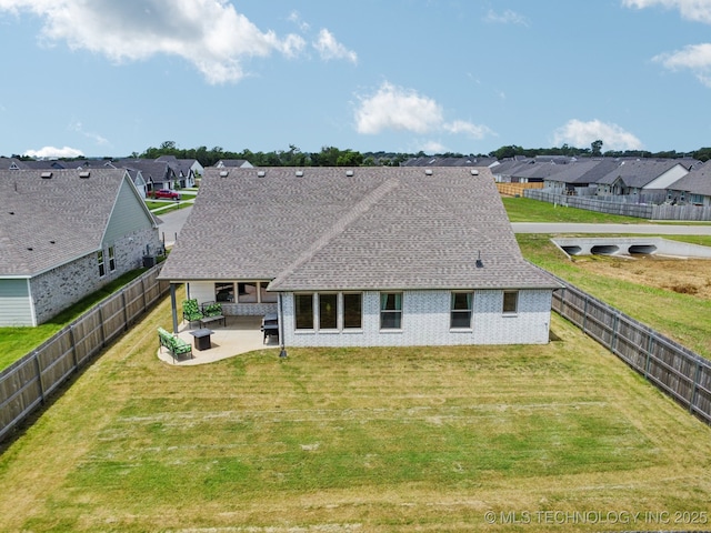 7413 N 160th E Ave, Owasso, OK 74055 - rear view of property with a patio area, a residential view, roof with shingles, and a fenced backyard
