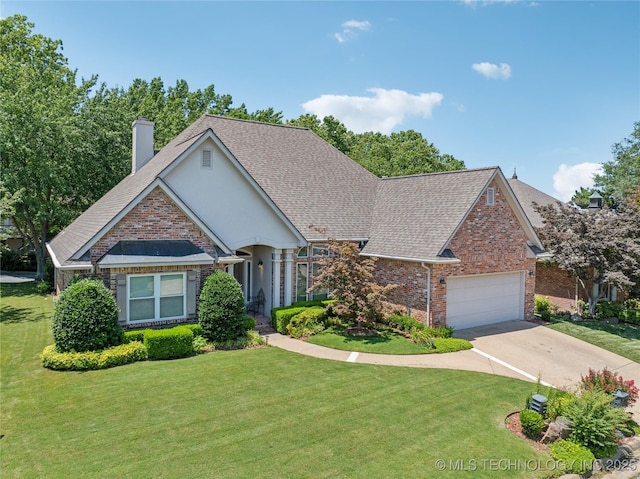 7534 S Hudson Pl, Tulsa, OK 74136 - view of front of house featuring brick siding, an attached garage, a front yard, a chimney, and driveway