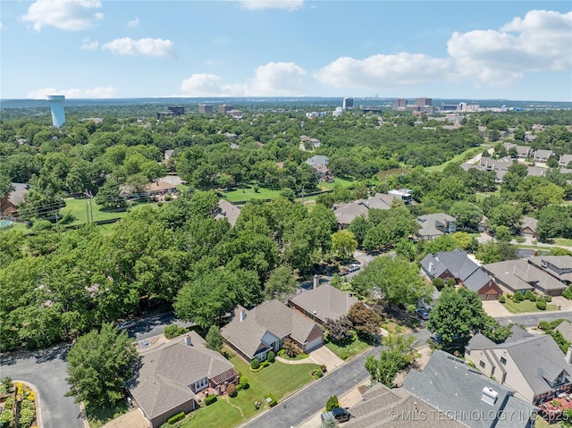 7534 S Hudson Pl, Tulsa, OK 74136 - aerial perspective of suburban area featuring a tree filled landscape