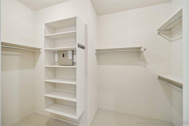 7534 S Hudson Pl, Tulsa, OK 74136 - spacious closet with carpet flooring