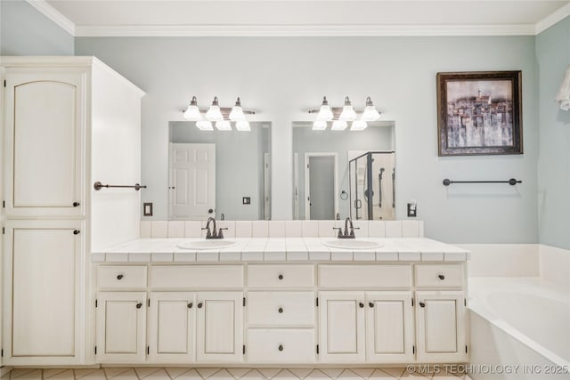 7534 S Hudson Pl, Tulsa, OK 74136 - full bathroom with a shower stall, a garden tub, double vanity, and crown molding