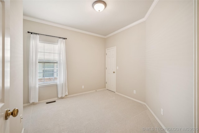 7534 S Hudson Pl, Tulsa, OK 74136 - carpeted empty room with ornamental molding and baseboards