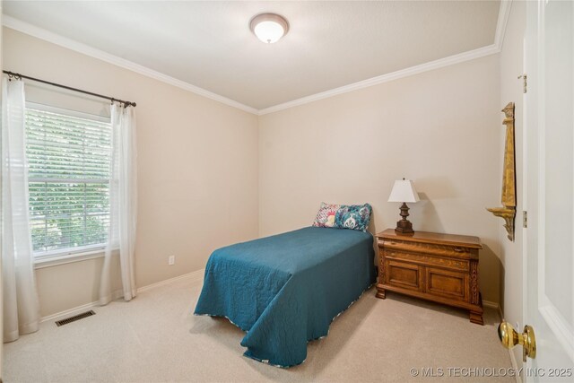 7534 S Hudson Pl, Tulsa, OK 74136 - carpeted bedroom featuring crown molding