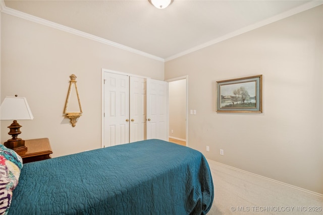 7534 S Hudson Pl, Tulsa, OK 74136 - carpeted bedroom with crown molding and a closet