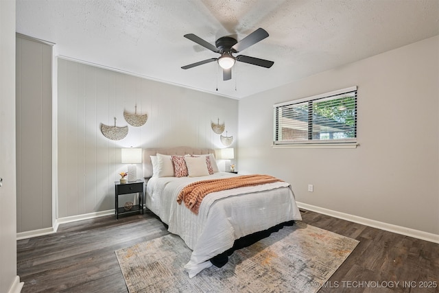 3350 E 54th St, Tulsa, OK 74135 - bedroom featuring wood finished floors, a textured ceiling, and ceiling fan