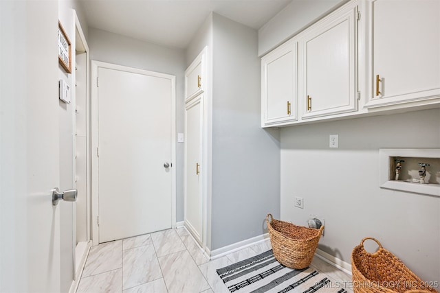 3350 E 54th St, Tulsa, OK 74135 - washroom featuring cabinet space, hookup for a washing machine, and light marble finish floors