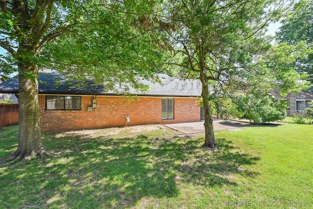 3350 E 54th St, Tulsa, OK 74135 - rear view of property featuring brick siding and a patio