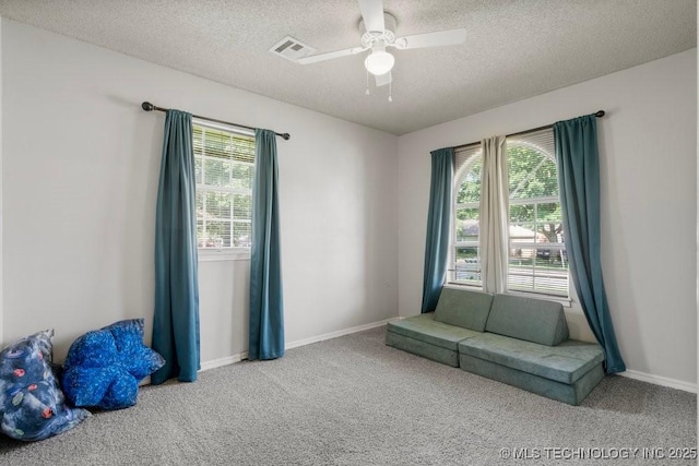 22 Mary St, Kiefer, OK 74041 - unfurnished room with carpet flooring, a textured ceiling, and a ceiling fan