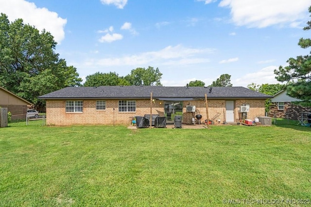 22 Mary St, Kiefer, OK 74041 - back of property featuring brick siding and a fenced backyard