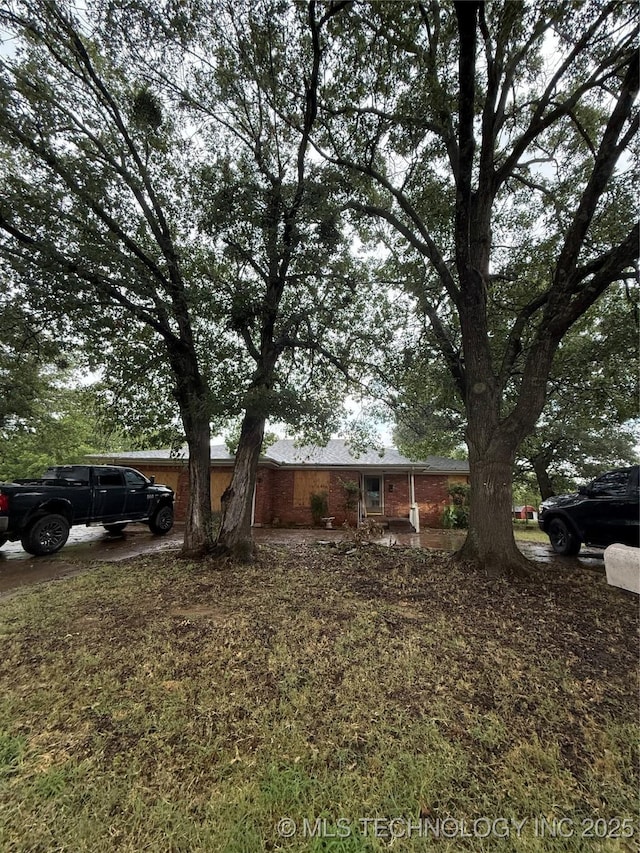 1518 N Washington St, Ardmore, OK 73401 - ranch-style house with brick siding