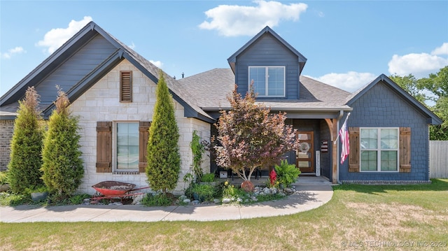21820 Summit Trl, Claremore, OK 74019 - view of front of house featuring a front yard and a shingled roof