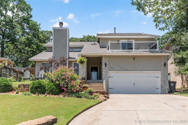 9622 S Maplewood Ave, Tulsa, OK 74137 - view of front of property with a balcony, stone siding, and concrete driveway