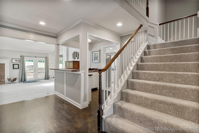 9622 S Maplewood Ave, Tulsa, OK 74137 - stairs with french doors, ornamental molding, wood-type flooring, recessed lighting, and a textured ceiling