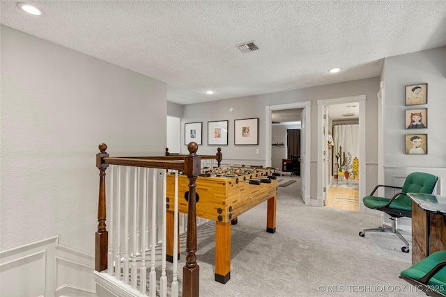 9622 S Maplewood Ave, Tulsa, OK 74137 - rec room featuring light colored carpet, recessed lighting, and a textured ceiling