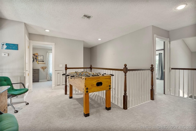 9622 S Maplewood Ave, Tulsa, OK 74137 - recreation room featuring carpet flooring, a textured ceiling, and recessed lighting