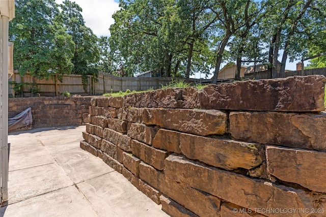 9622 S Maplewood Ave, Tulsa, OK 74137 - fenced backyard featuring a patio area