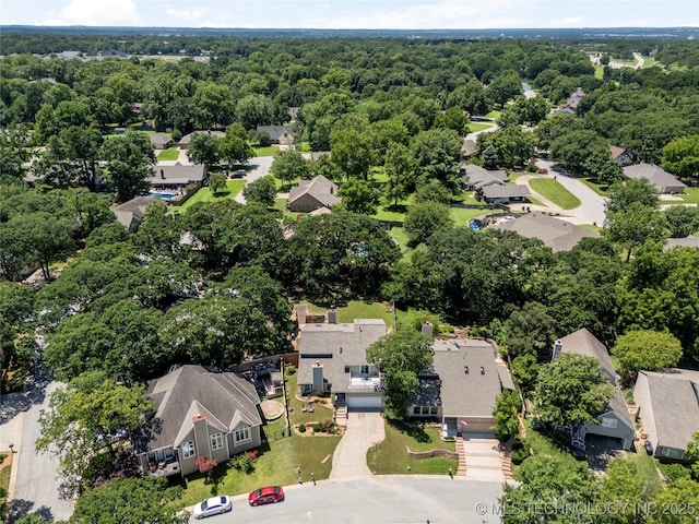 9622 S Maplewood Ave, Tulsa, OK 74137 - aerial perspective of suburban area with a heavily wooded area