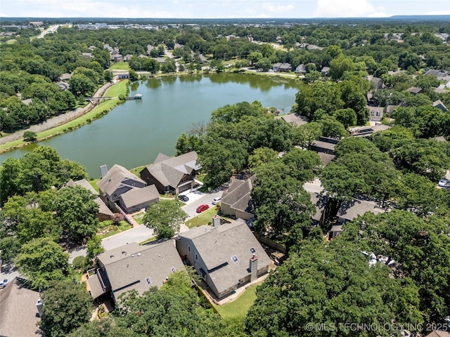 9622 S Maplewood Ave, Tulsa, OK 74137 - aerial view of residential area featuring a large body of water and a tree filled landscape