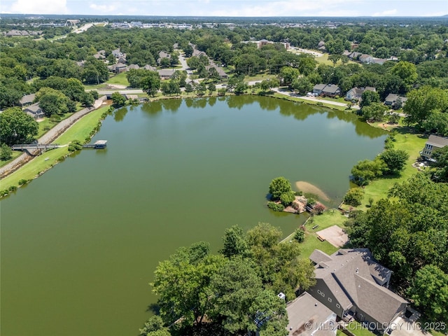 9622 S Maplewood Ave, Tulsa, OK 74137 - drone / aerial view of a nearby body of water and a tree filled landscape