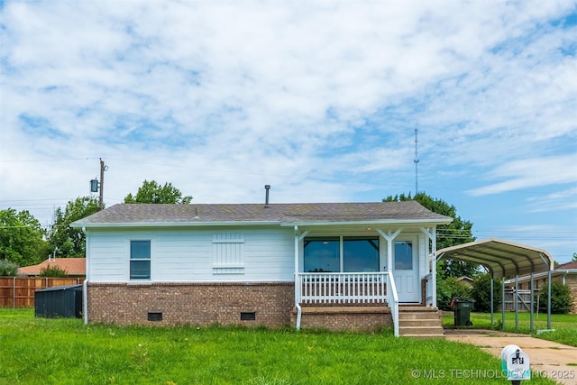 104 Gardenia Pl, Mannford, OK 74044 - view of front facade with a carport, crawl space, brick siding, and covered porch