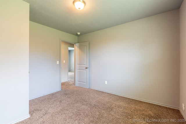 104 Gardenia Pl, Mannford, OK 74044 - empty room with carpet floors and baseboards