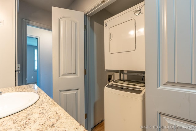 104 Gardenia Pl, Mannford, OK 74044 - laundry area with stacked washer and clothes dryer