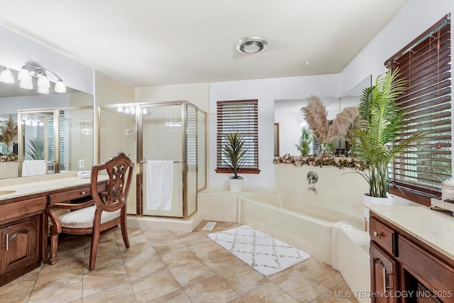 4335 E 87th St, Tulsa, OK 74137 - full bath featuring vanity, a garden tub, a stall shower, and tile patterned floors