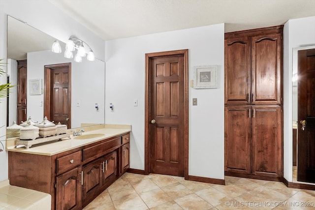 4335 E 87th St, Tulsa, OK 74137 - bathroom with vanity and baseboards