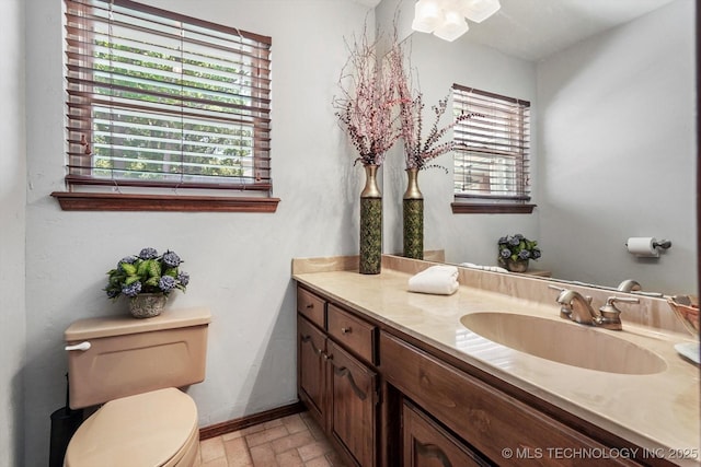 4335 E 87th St, Tulsa, OK 74137 - bathroom featuring vanity and brick patterned floors