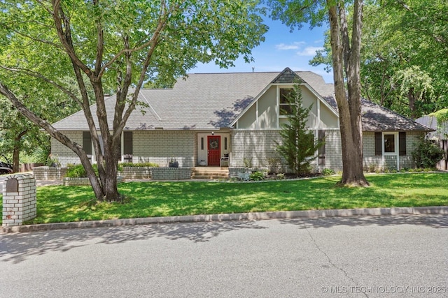 4335 E 87th St, Tulsa, OK 74137 - view of front of home with a front yard and brick siding