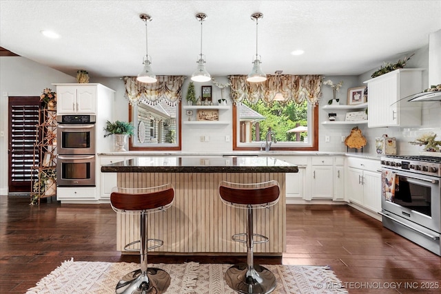 4335 E 87th St, Tulsa, OK 74137 - kitchen with open shelves, stainless steel appliances, dark wood-style floors, backsplash, and recessed lighting