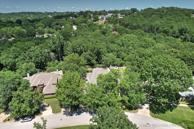 4335 E 87th St, Tulsa, OK 74137 - view of property location with a heavily wooded area