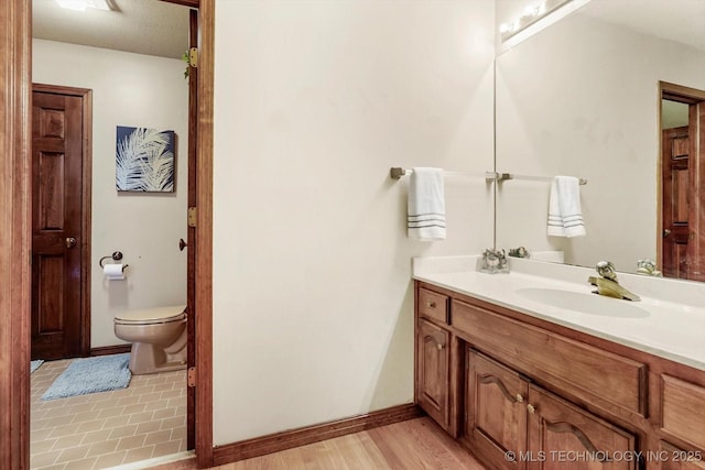 4335 E 87th St, Tulsa, OK 74137 - bathroom featuring vanity and wood finished floors