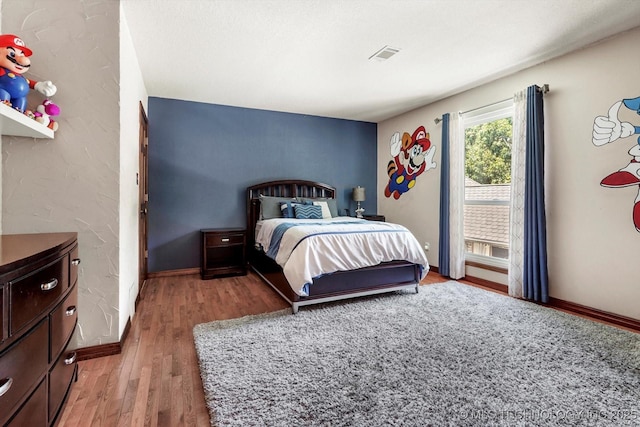 4335 E 87th St, Tulsa, OK 74137 - bedroom with wood finished floors and baseboards