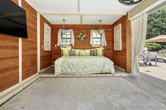 4335 E 87th St, Tulsa, OK 74137 - bedroom featuring wood walls, access to exterior, and carpet