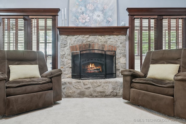 10102 N 147th E Ave, Owasso, OK 74055 - living area with carpet and a fireplace