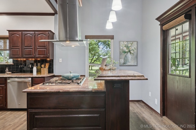 10102 N 147th E Ave, Owasso, OK 74055 - kitchen with stainless steel appliances, ventilation hood, light wood-style floors, and dark brown cabinetry